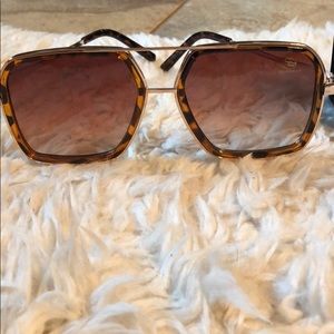 SAGII tortoise shell with gold rimmed sunglasses